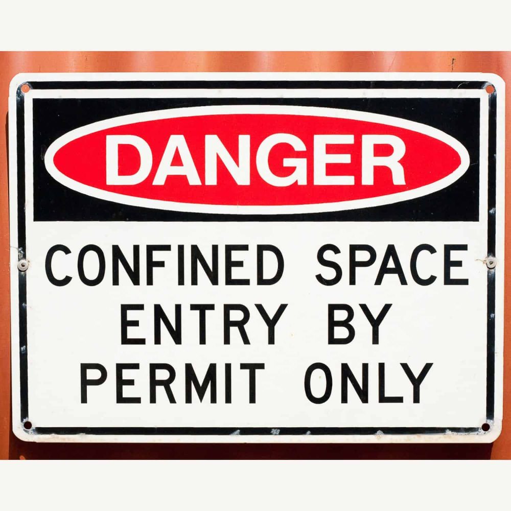 Warning sign for confined space entry only with permit required.