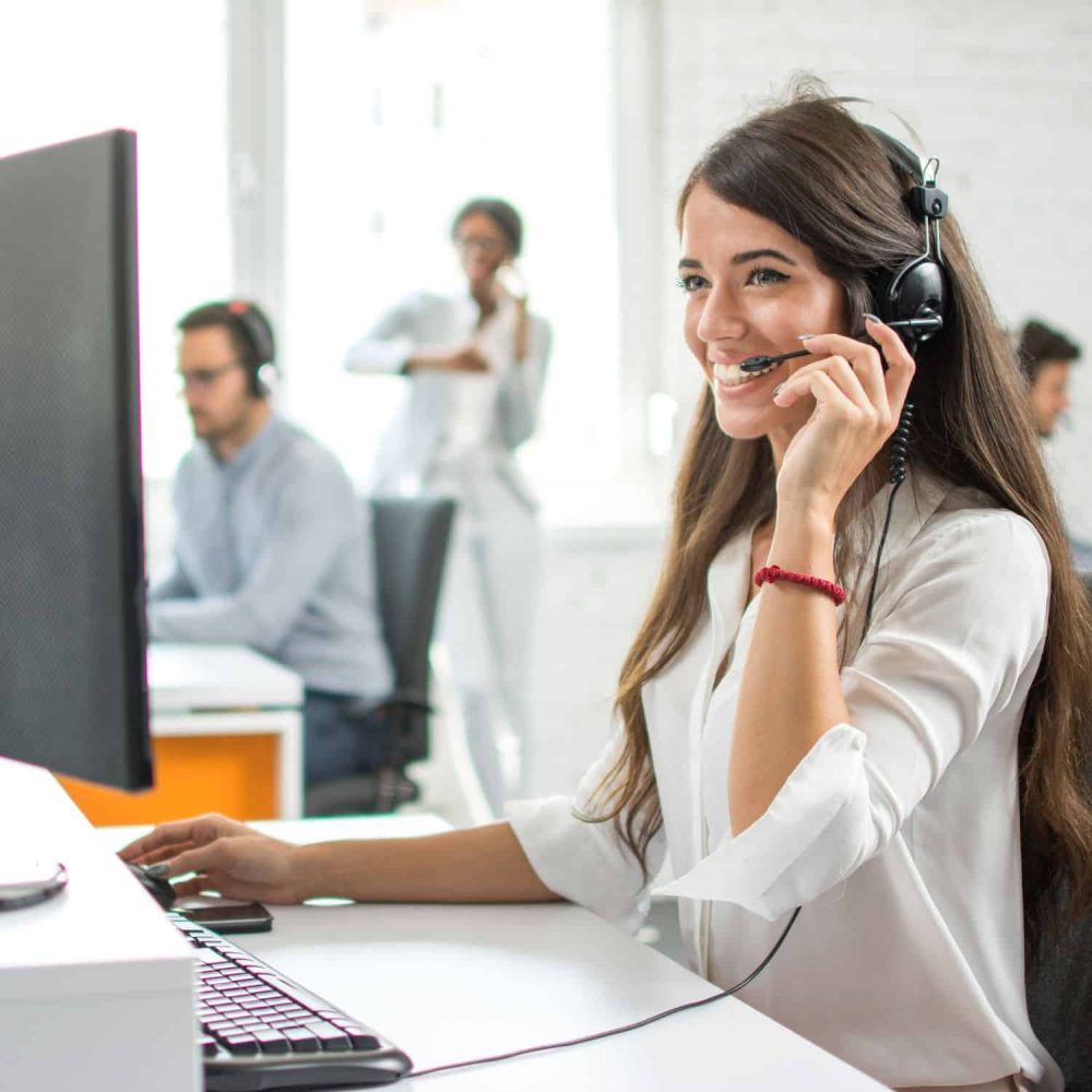 Customer service representative with headset at training course.
